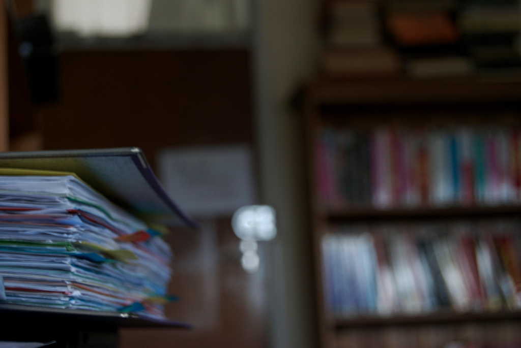 photograph of papers stacked within a folder